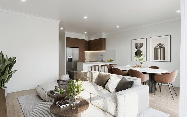 The Eclipse colour scheme in the same open-plan living and dining area, with pale oak kitchen cabinetry, olive green dining chairs and pale timber flooring beside a large garden window.